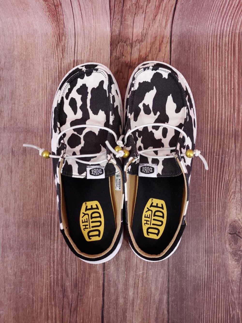 Hey Dude Womens Size 7 Wendy Slip On Classic White Black Cow Print Shoes - Picture 6 of 13